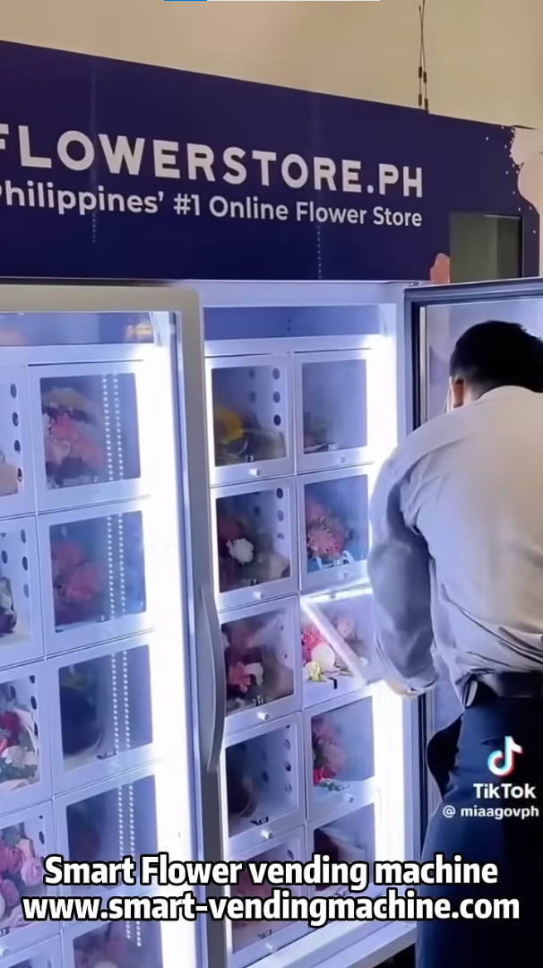 Smart fresh flower vending machine located in a busy Manila shopping mall, featuring GCash payment and cooling system.