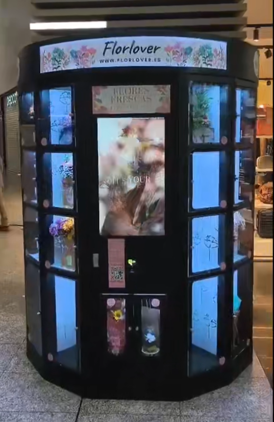 WEIMI's Fresh Flower Vending Machine is revolutionizing luxury malls in Spain, offering perfectly preserved flowers with cutting-edge technology and a sleek, VIP shopping experience.