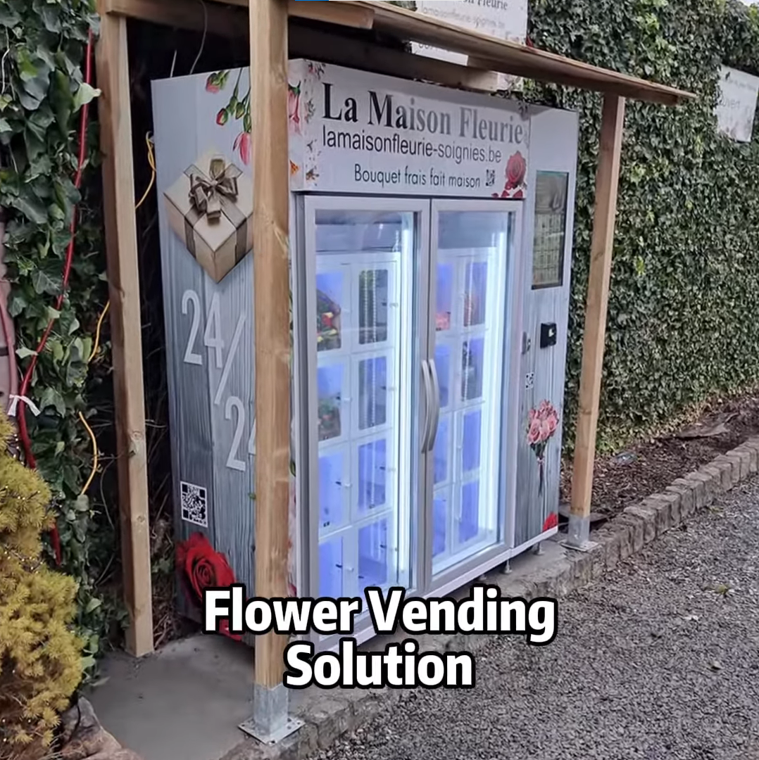 Successful flower business owner restocking a smart WEIMI flower vending machine in a premium shopping center.
